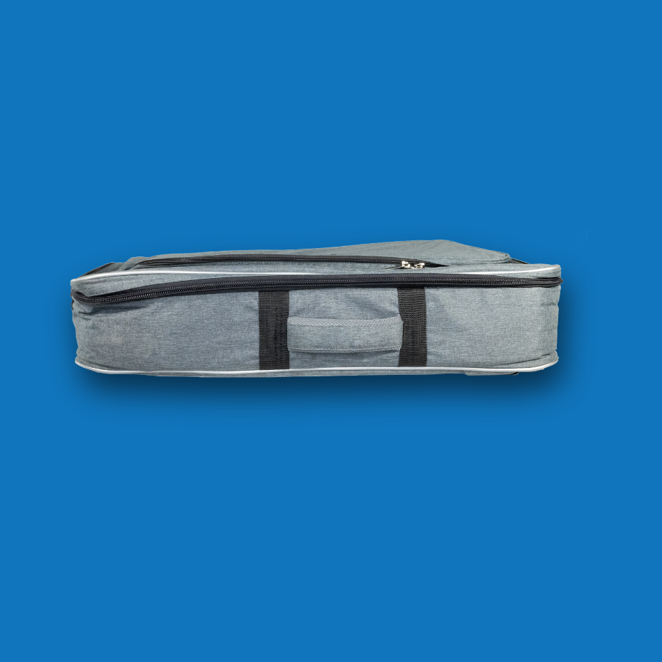 Gray large pedalboard gig bag with black straps on a blue background